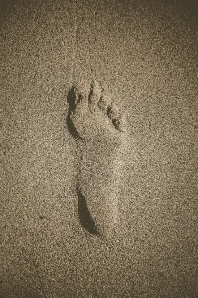 Voetafdruk in het zand